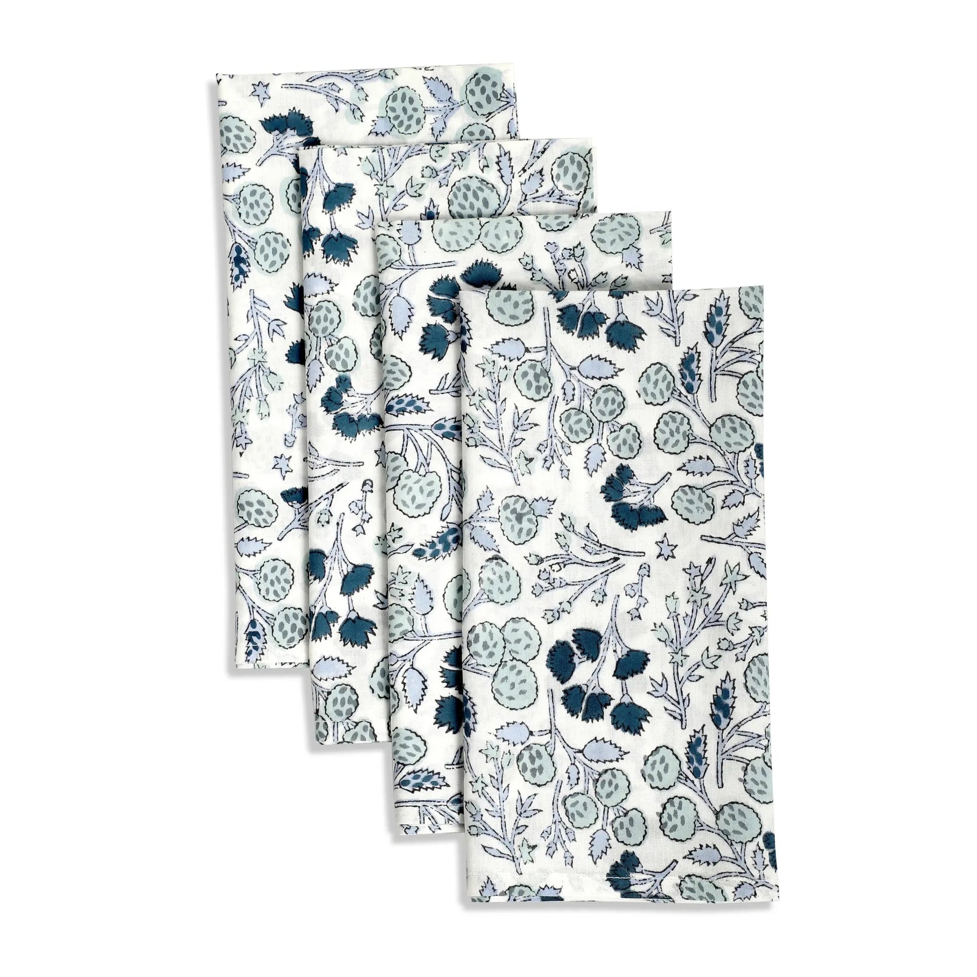 Set of four floral-patterned towels on a white background
