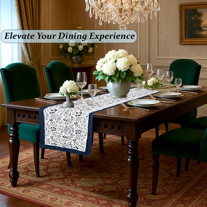 Dining room with a table set for dinner, flowers, and elegant decor.