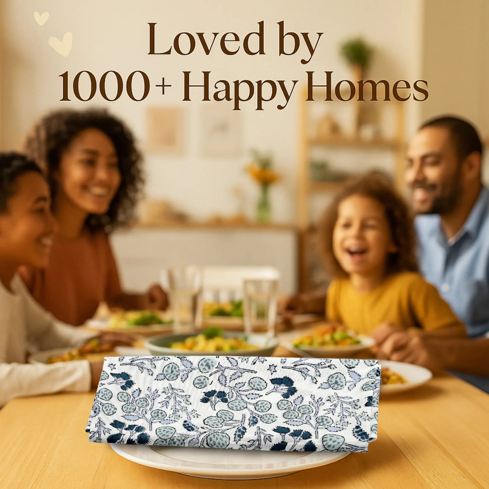 Family enjoying a meal together with a decorative napkin in the foreground.