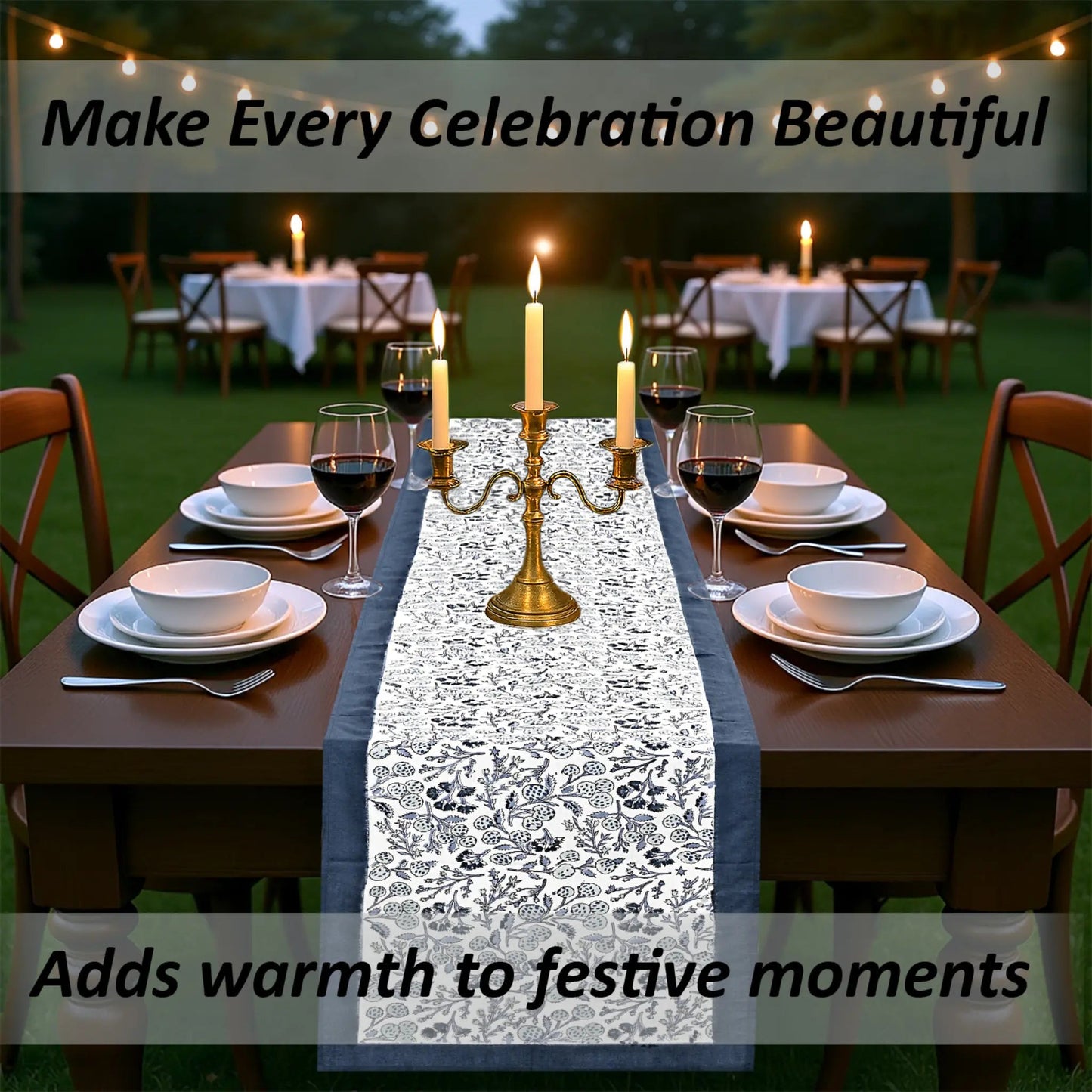 Dining table set for a celebration with candles and a decorative table runner.