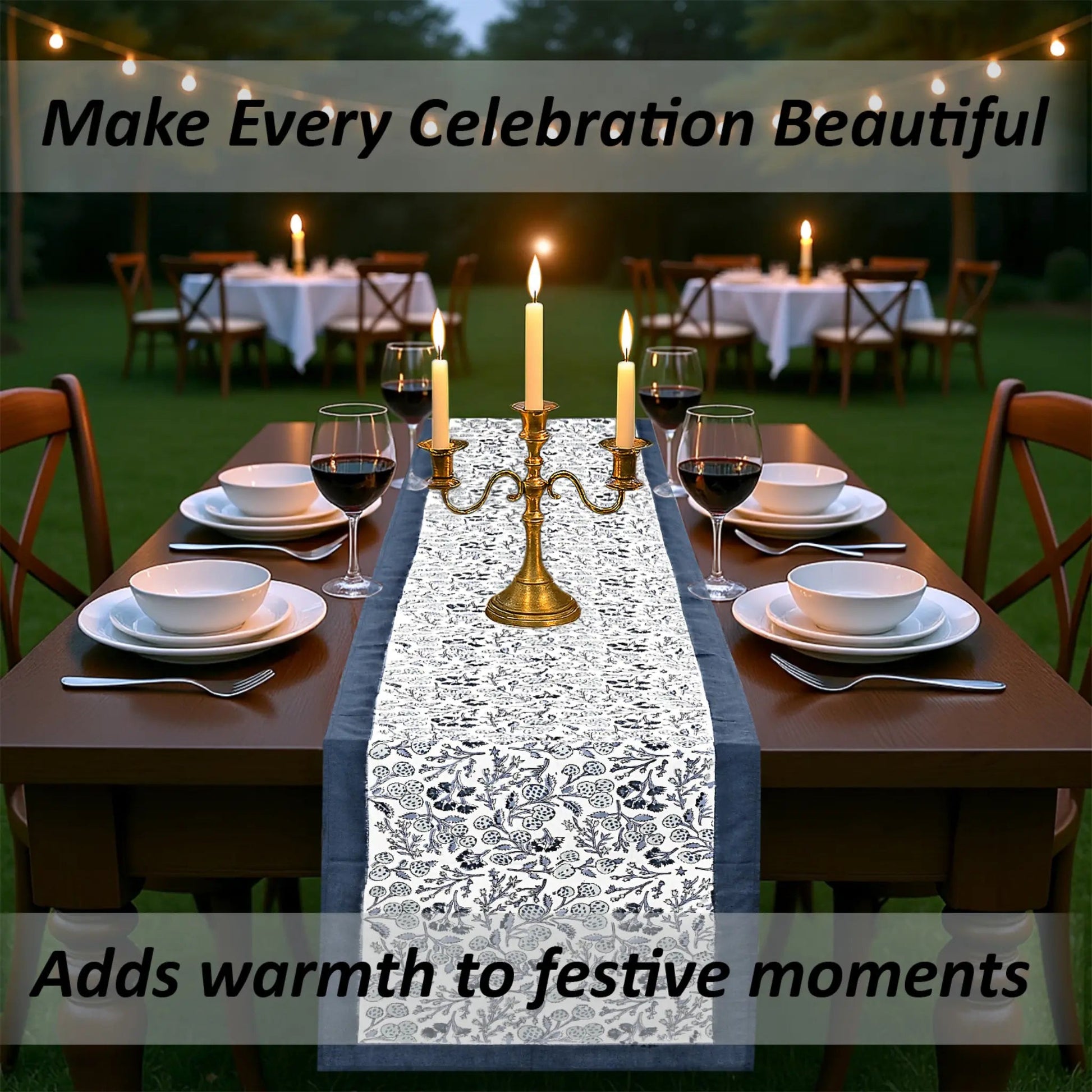 Dining table set for a celebration with candles and a decorative table runner.