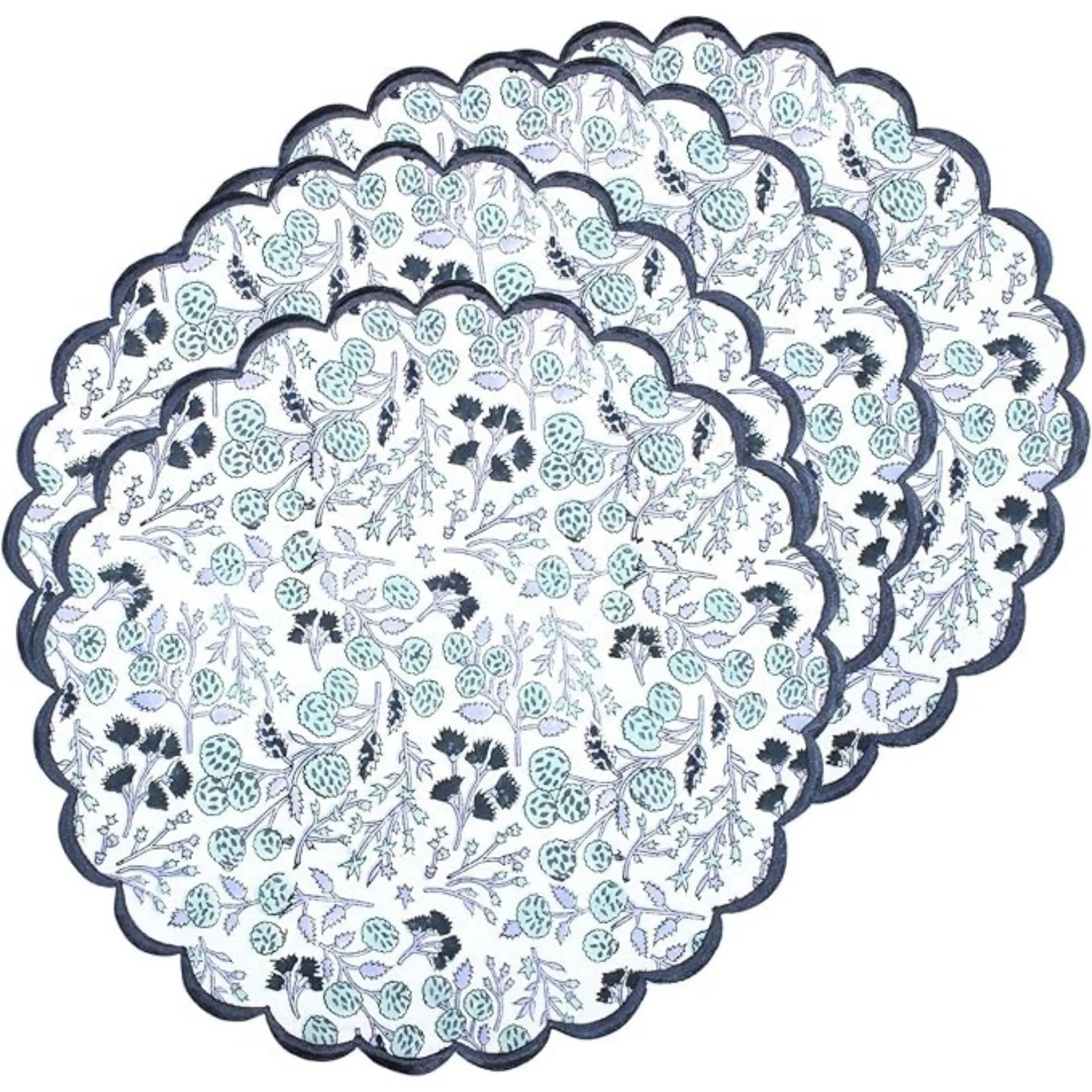 Set of floral-patterned paper doilies on a white background
