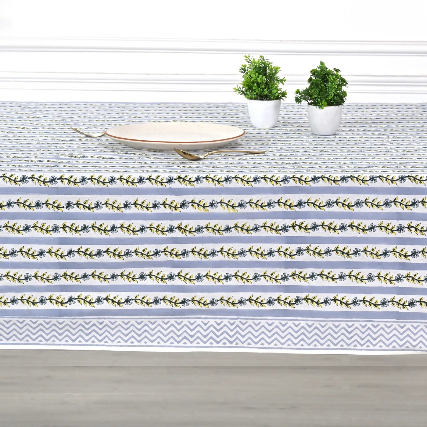 Table runner with floral pattern on a wooden table