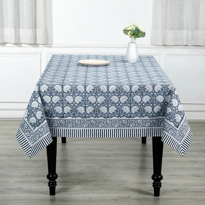 Tablecloth with blue and white pattern on a wooden table