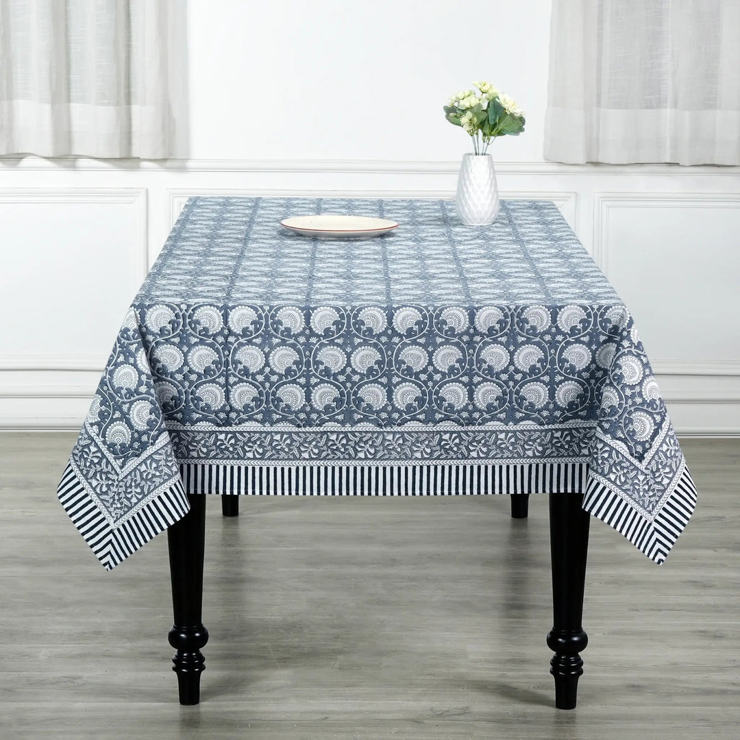 Tablecloth with blue and white pattern on a wooden table
