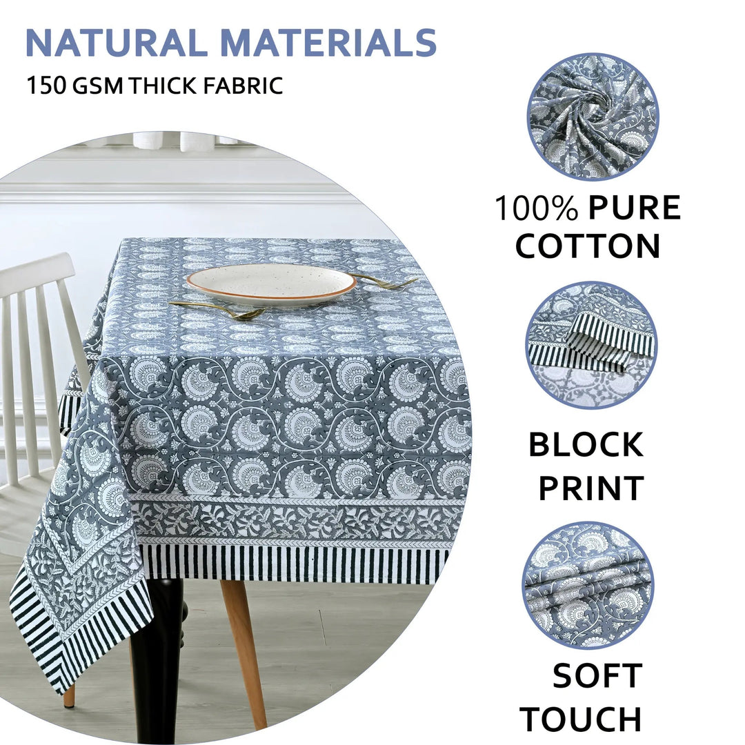 Tablecloth with block print design on a table, featuring text about material properties.