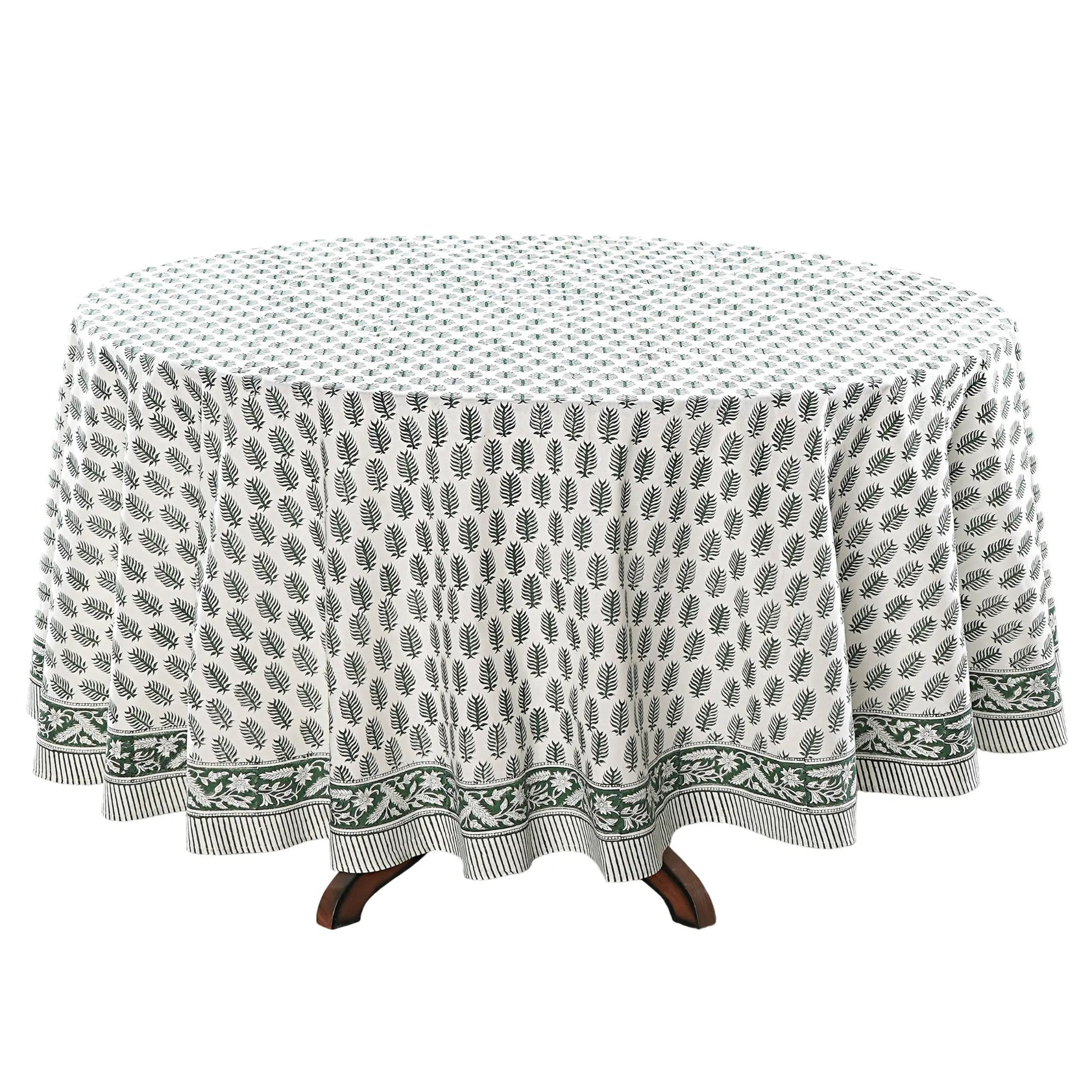 Round tablecloth with a leaf pattern on a white background