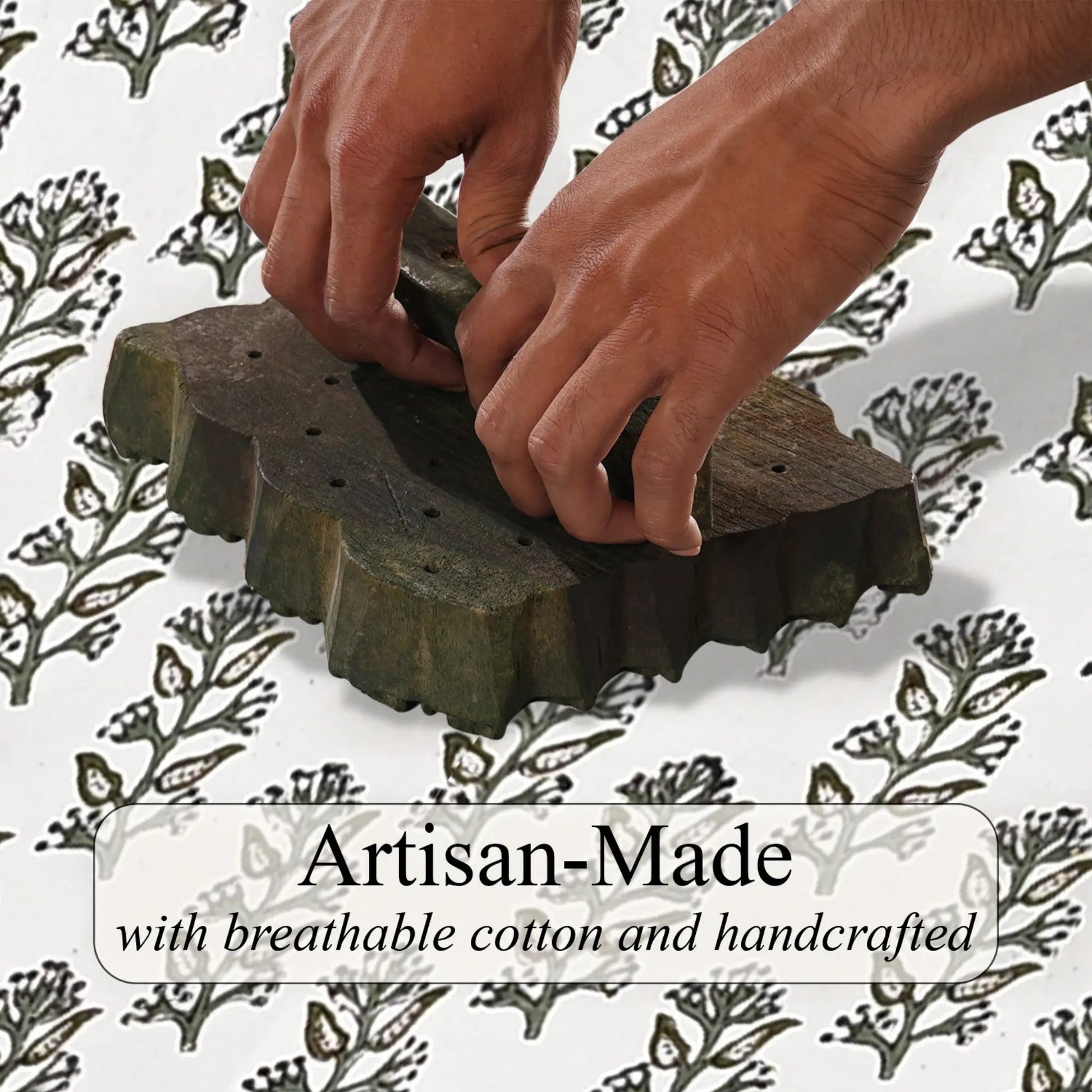 Hands working with a wooden mold against a patterned background