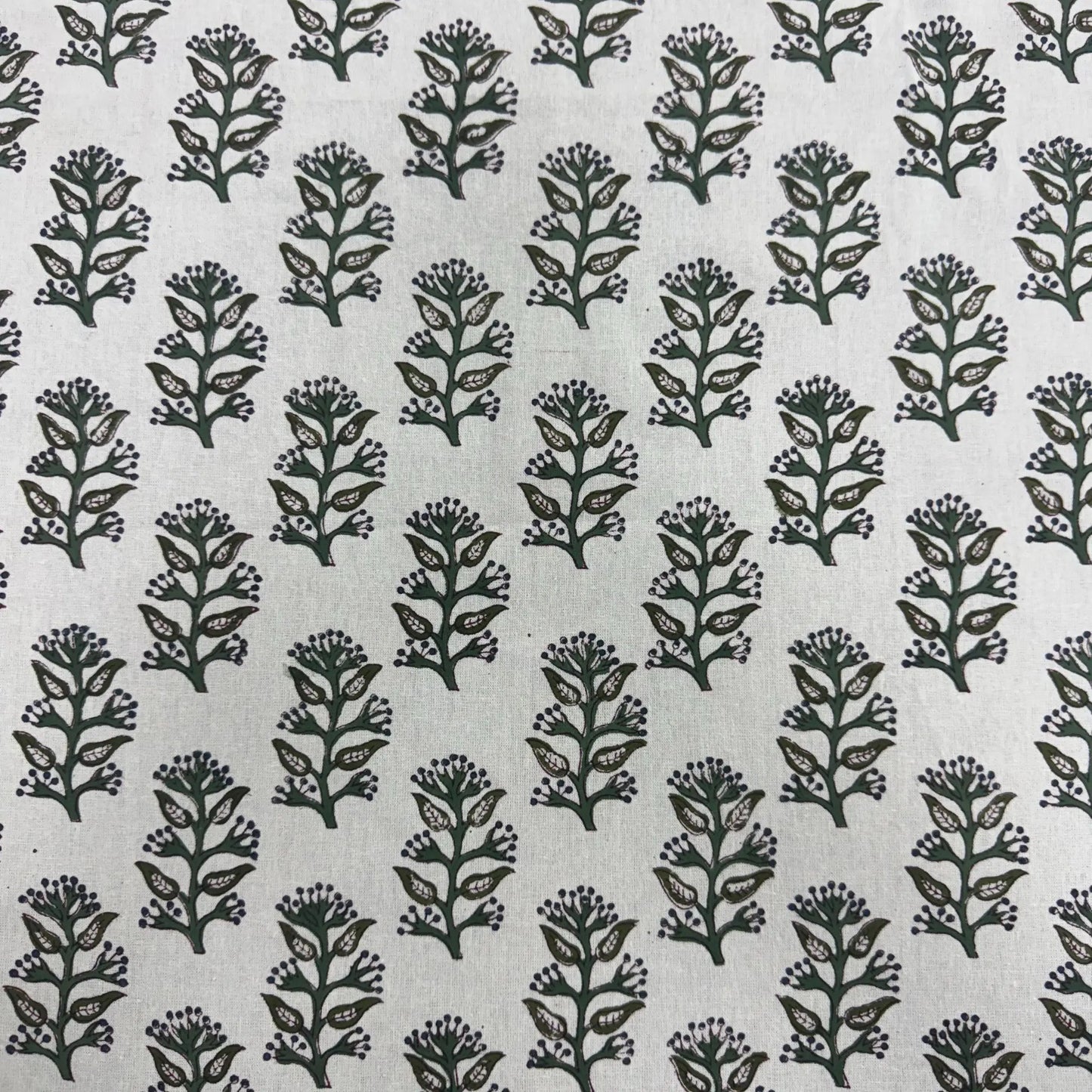 Pattern of black floral designs on a light gray background