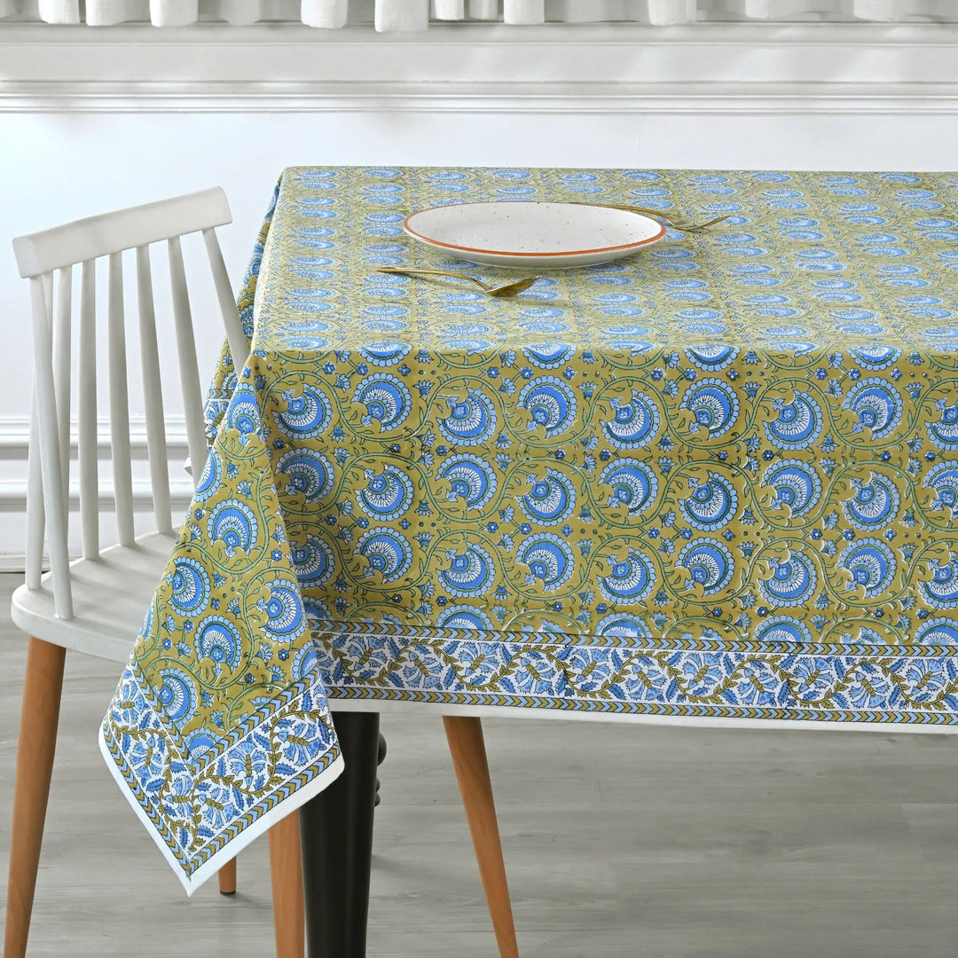 Tablecloth with blue and green pattern on a dining table