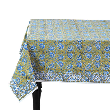Patterned tablecloth on a table with a white background