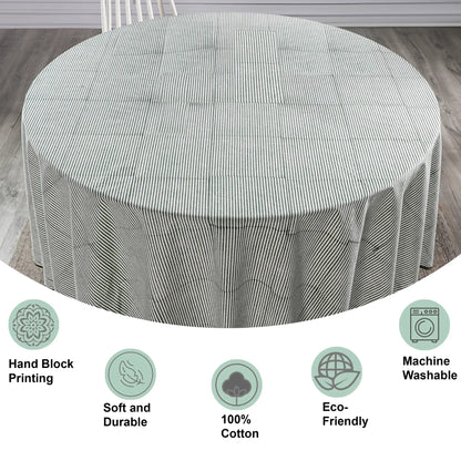 Round table with a striped tablecloth on a wooden floor, featuring icons and text about product features.
