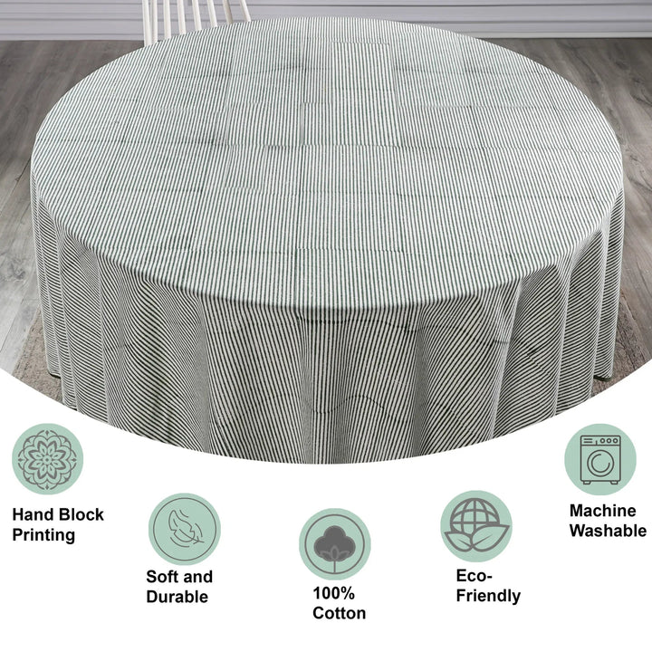Round table with a striped tablecloth on a wooden floor, featuring icons and text about product features.