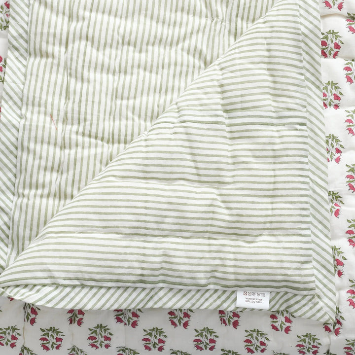 Striped fabric with a floral patterned border