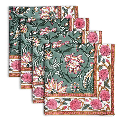 Set of floral patterned napkins with pink and green colors on a white background