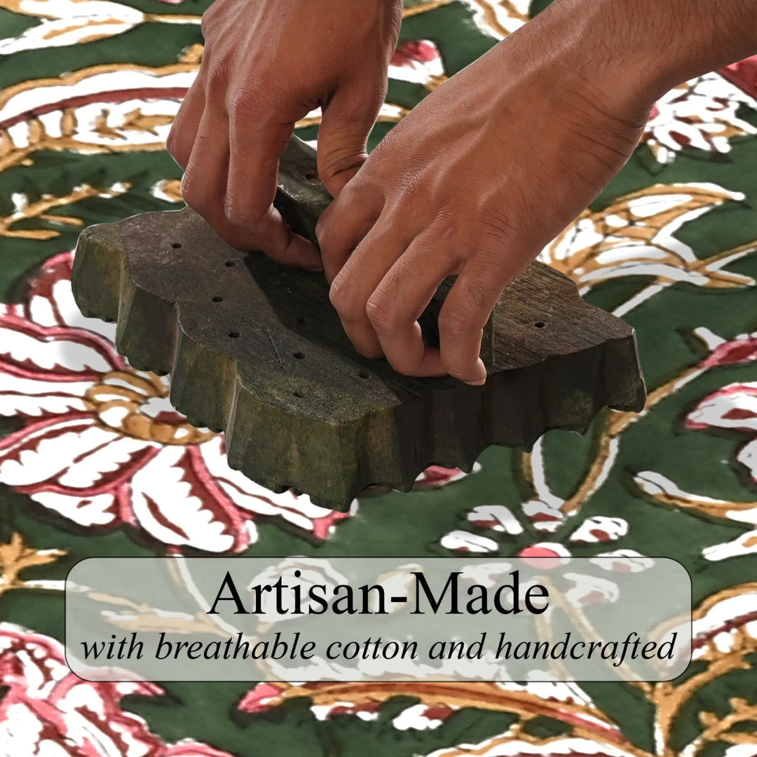 Hands using a wooden tool on a patterned fabric with &