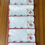 White Linen Napkins with Embroidered Motifs