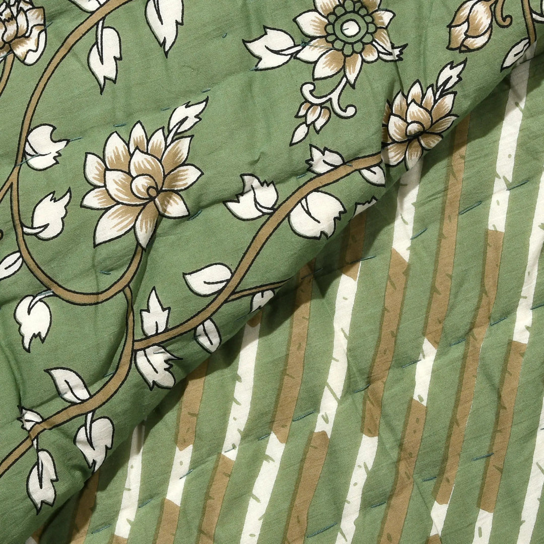 Close-up of floral patterned fabric with green background