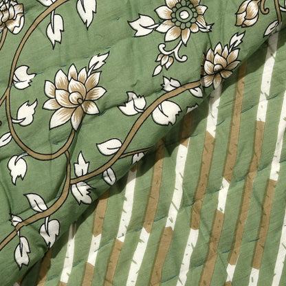 Close-up of floral patterned fabric with green background