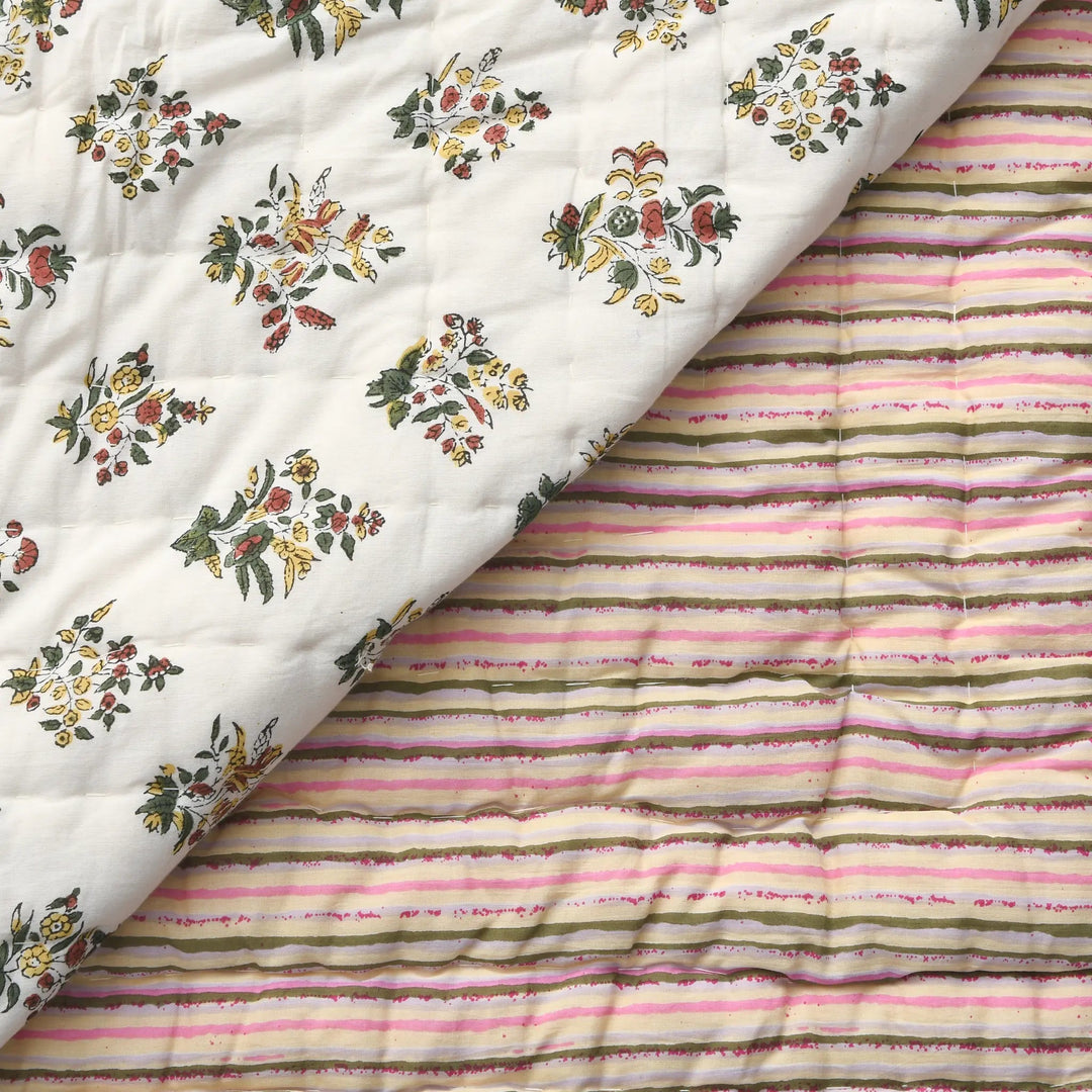 Two fabrics with floral and striped patterns on a white background