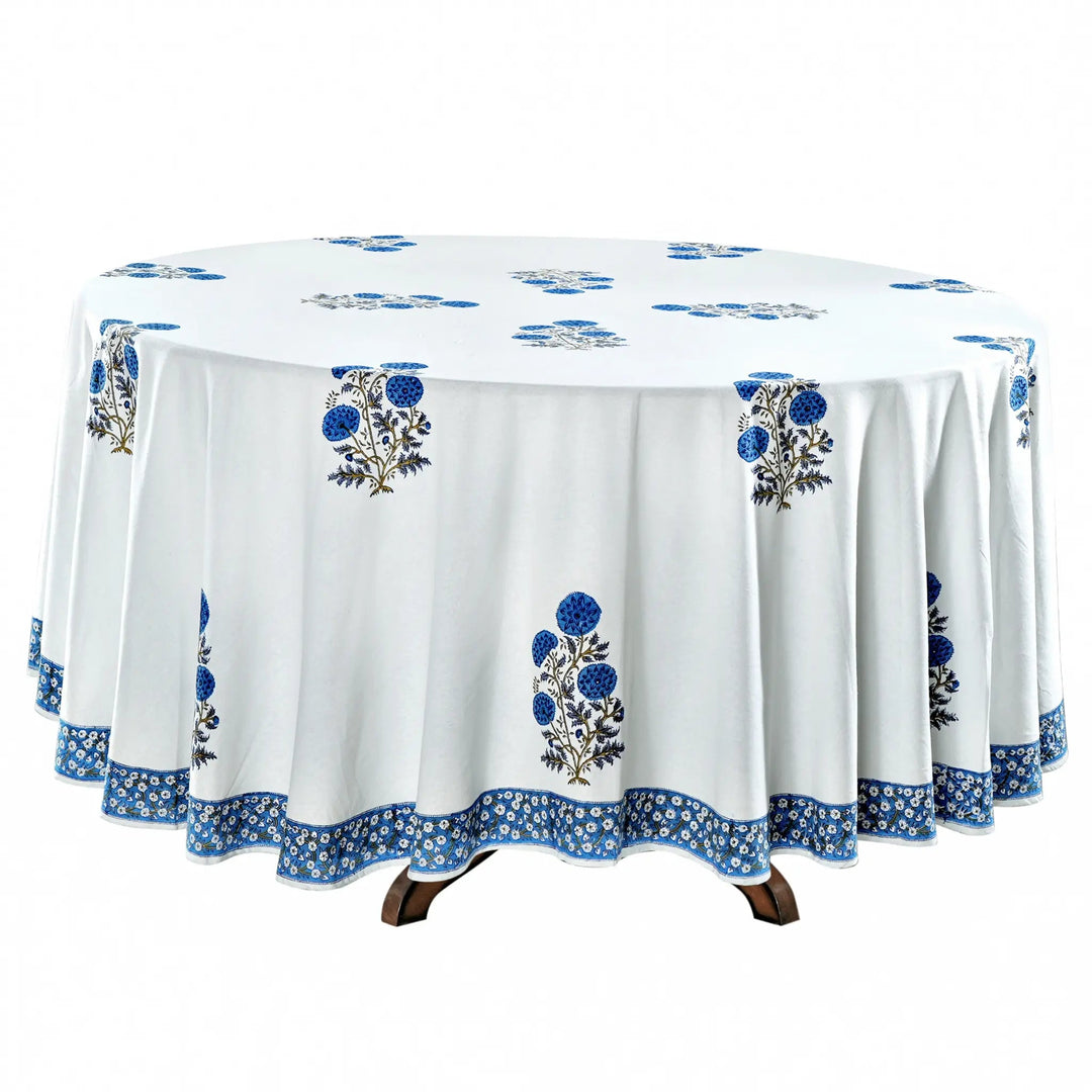 Round tablecloth with blue floral patterns on a white background