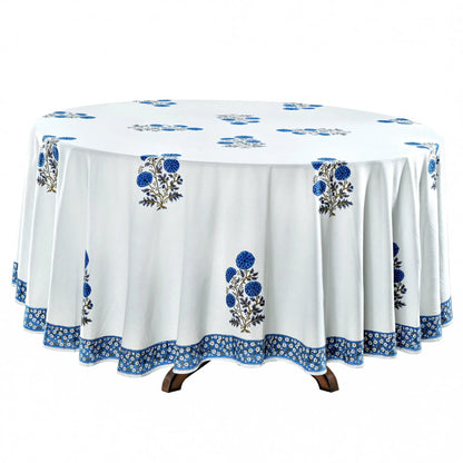 Round tablecloth with blue floral patterns on a white background