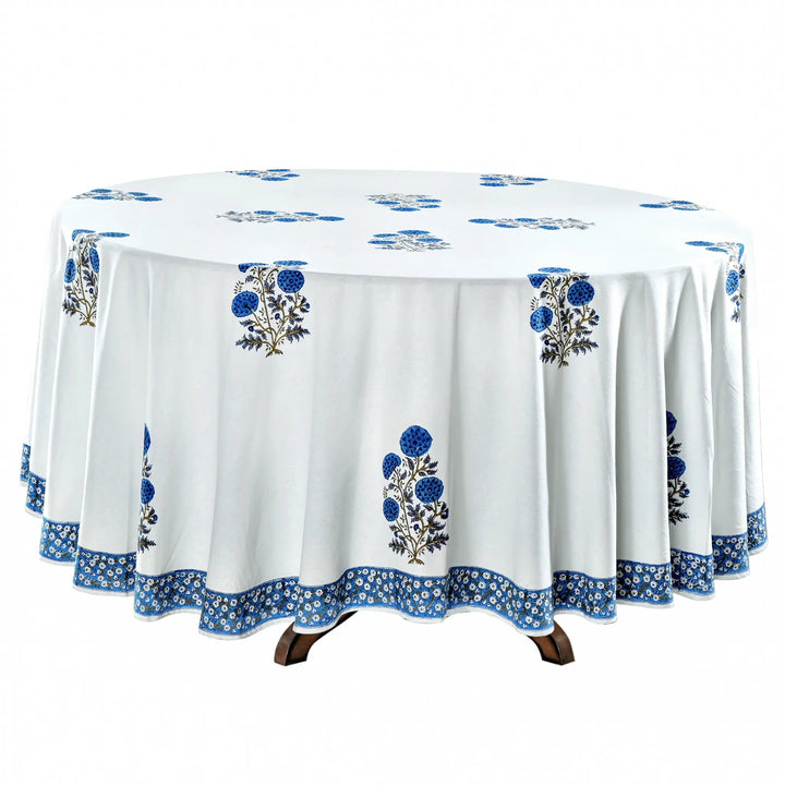 Round tablecloth with blue floral patterns on a white background