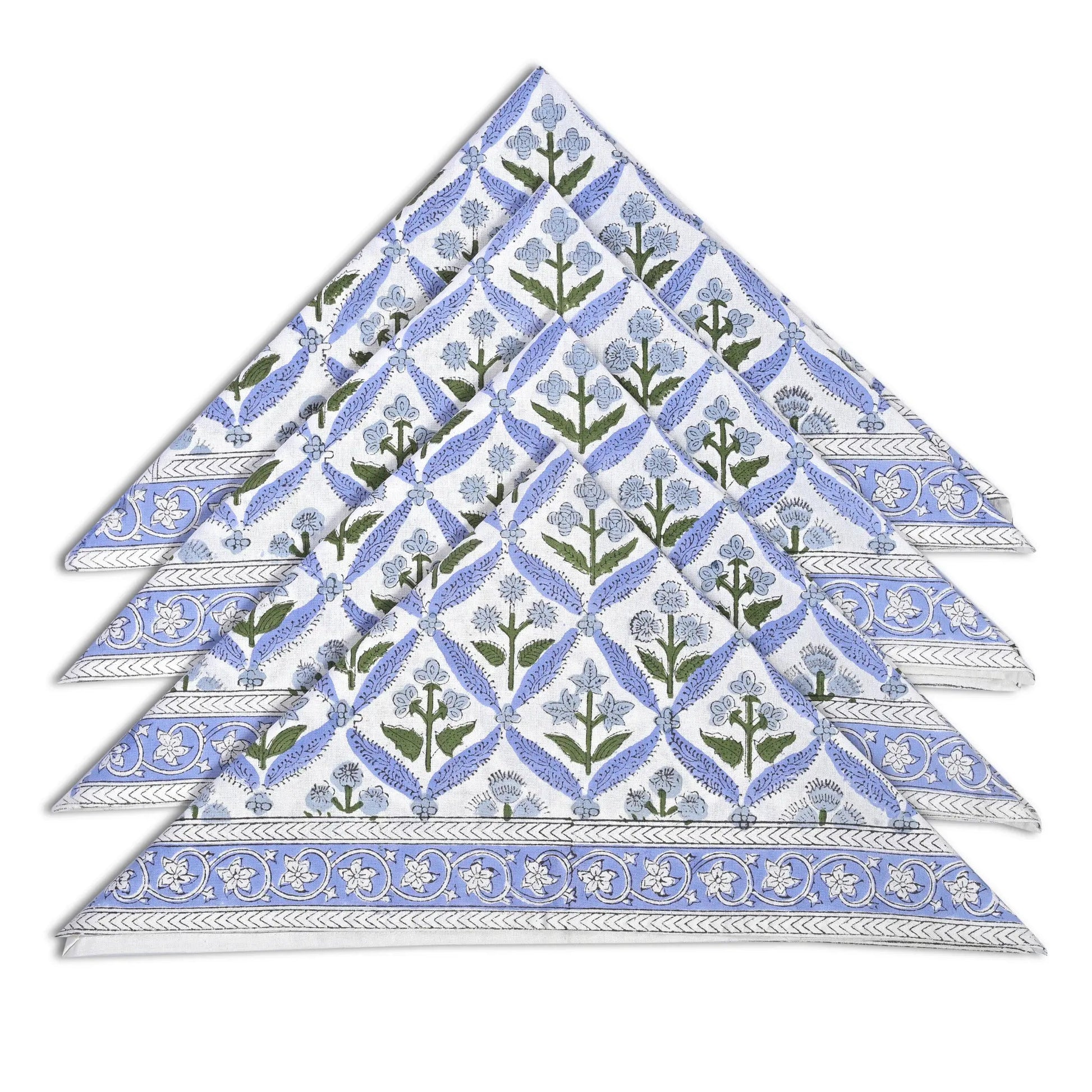 Set of six floral patterned napkins stacked on a white background