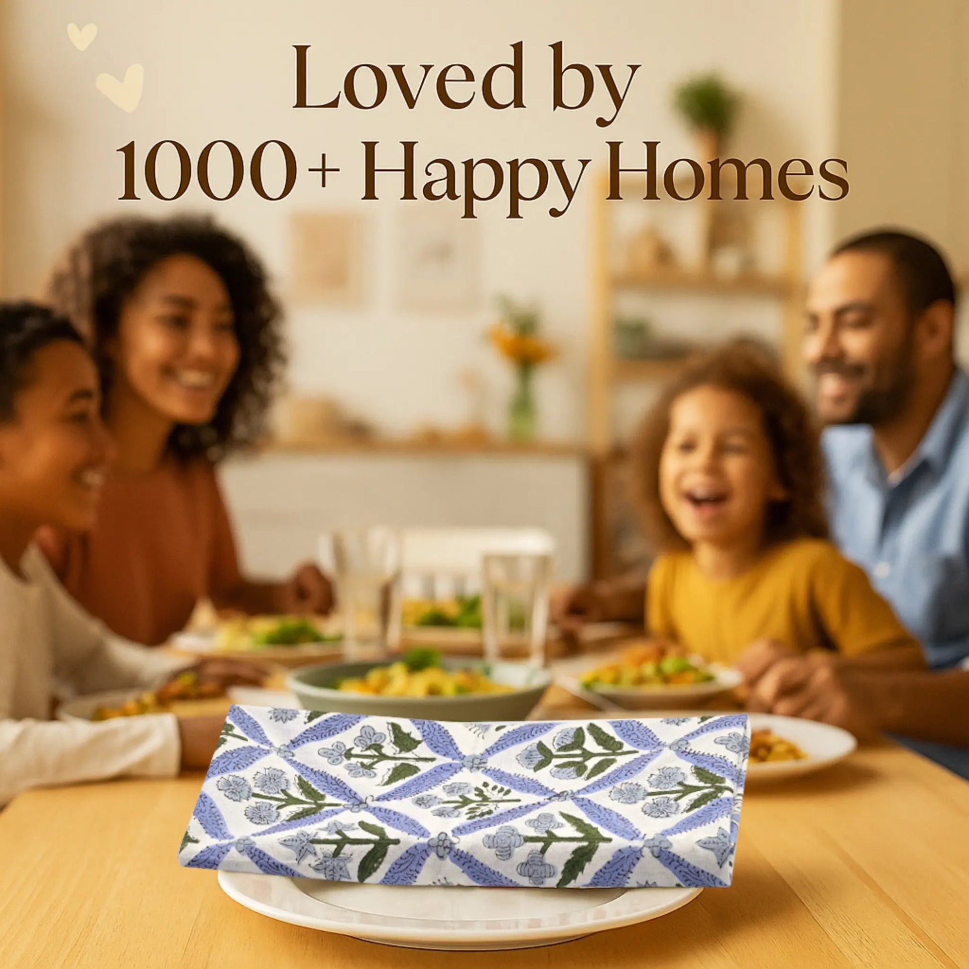 Family enjoying a meal together with a decorative napkin in the foreground.