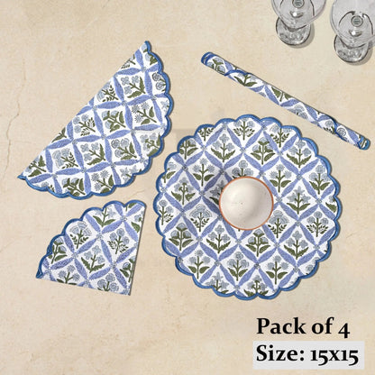 Pack of 4 blue and white patterned placemats on a beige background