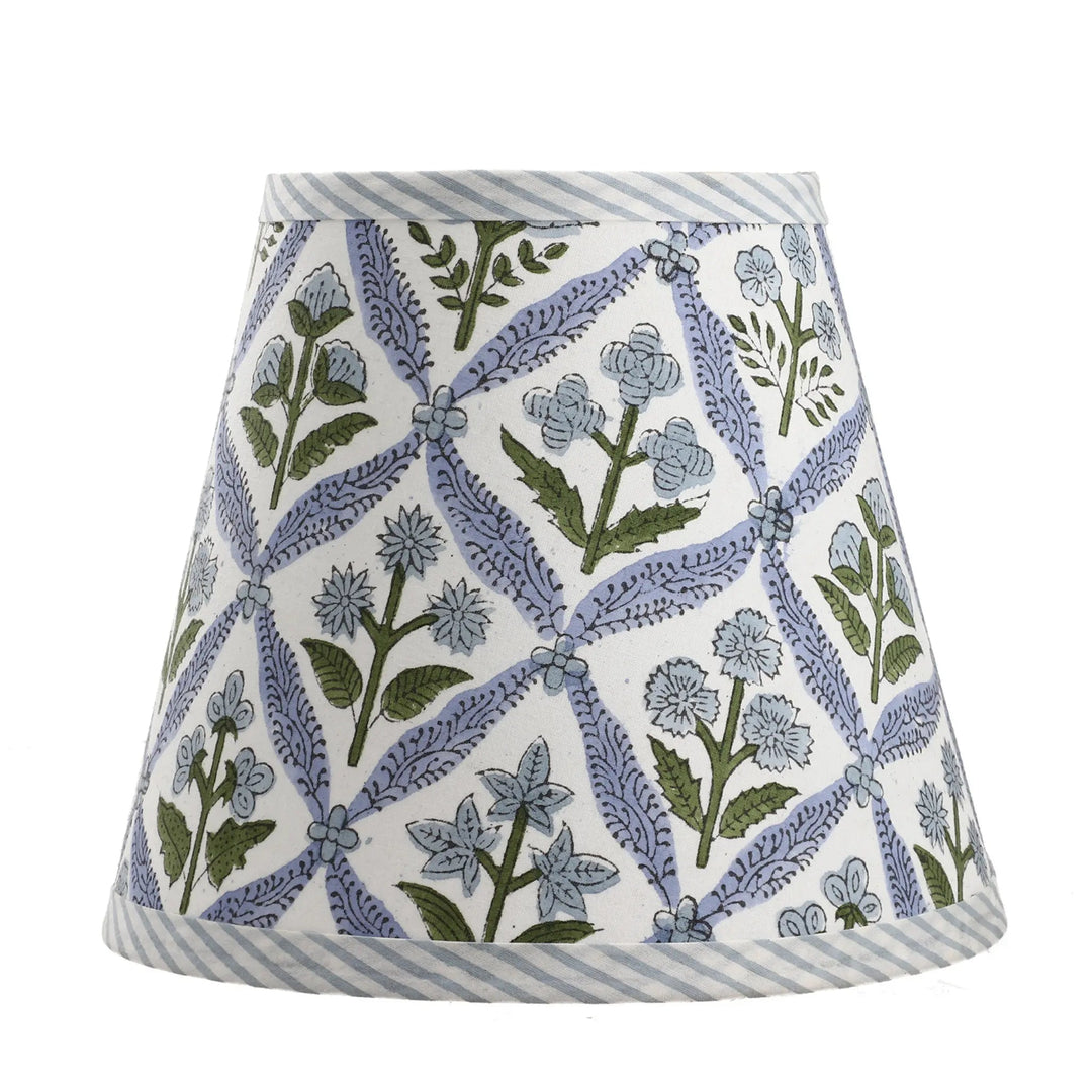 Skirt with floral pattern and striped hem on a white background
