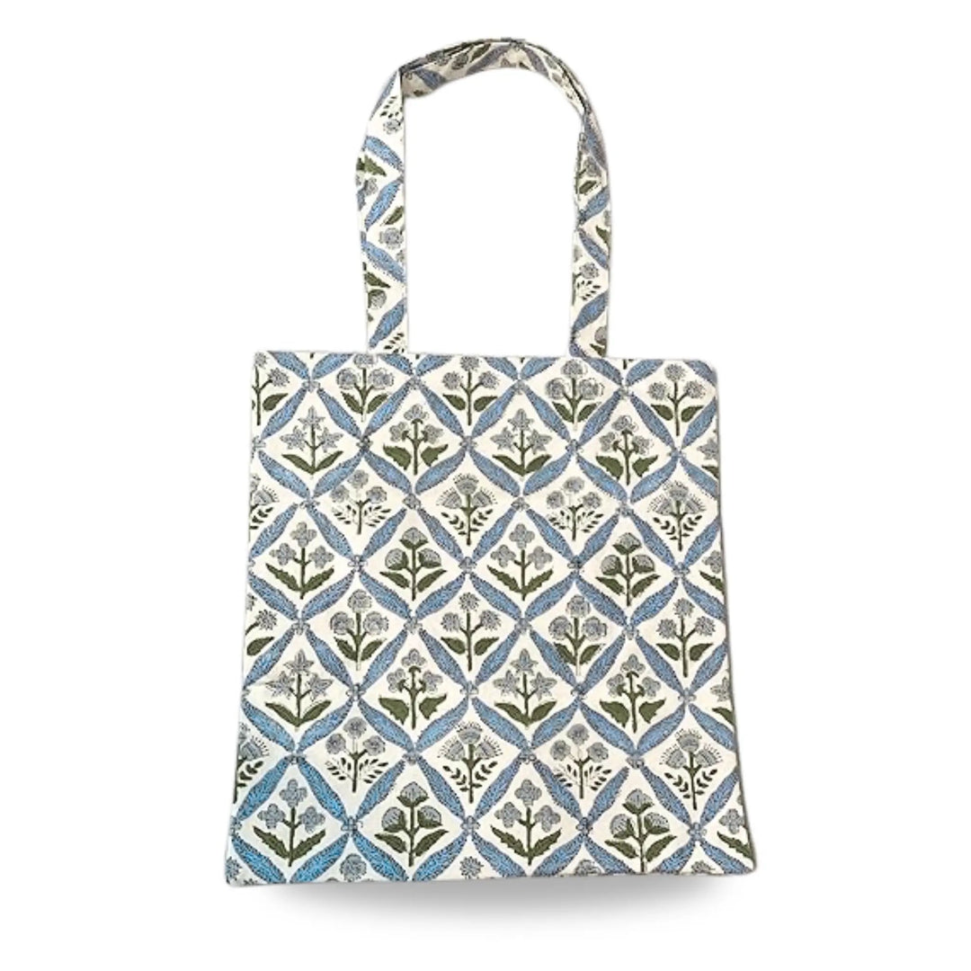 Tote bag with a blue and green geometric pattern on a white background