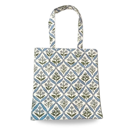Tote bag with a blue and green geometric pattern on a white background