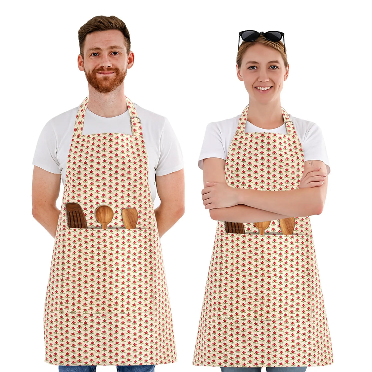 Two people wearing aprons with wooden spoon pockets on a white background