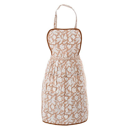 Floral dress with beige and white pattern on a white background