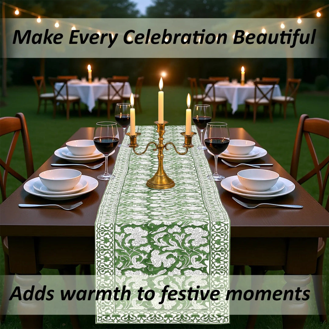 Dining table set for a celebration with candles and a decorative table runner.