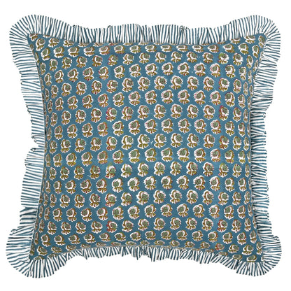 Decorative pillow with floral pattern and ruffled edge on a white background