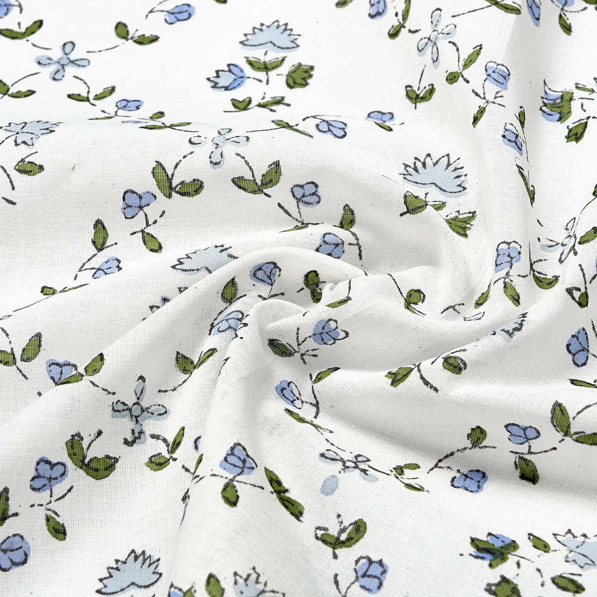 Floral patterned fabric with blue and green flowers on a white background