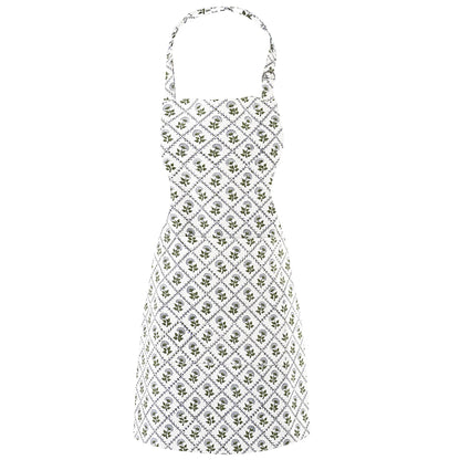 White dress with green floral pattern on a white background