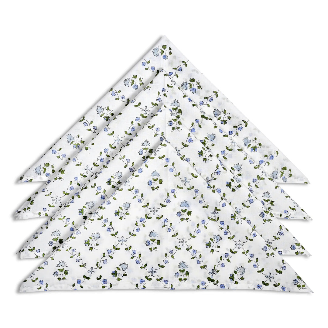 Set of floral-patterned napkins on a white background