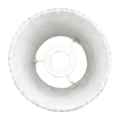 White plastic component on a white background