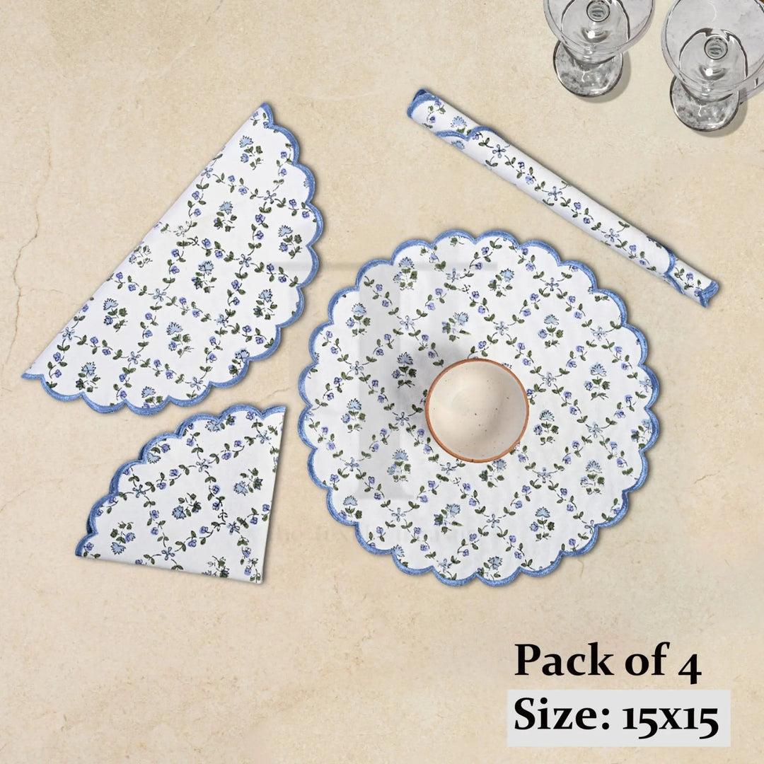 Set of floral placemats and coasters on a beige background with text indicating &