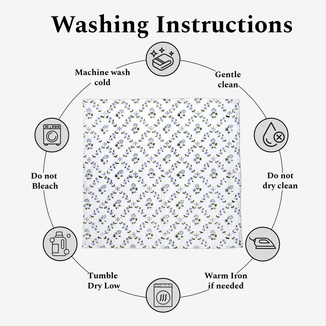 Washing instructions diagram with a floral patterned fabric in the center.