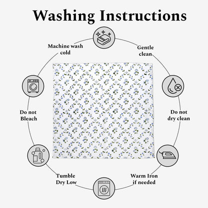 Washing instructions diagram with a floral patterned fabric in the center.