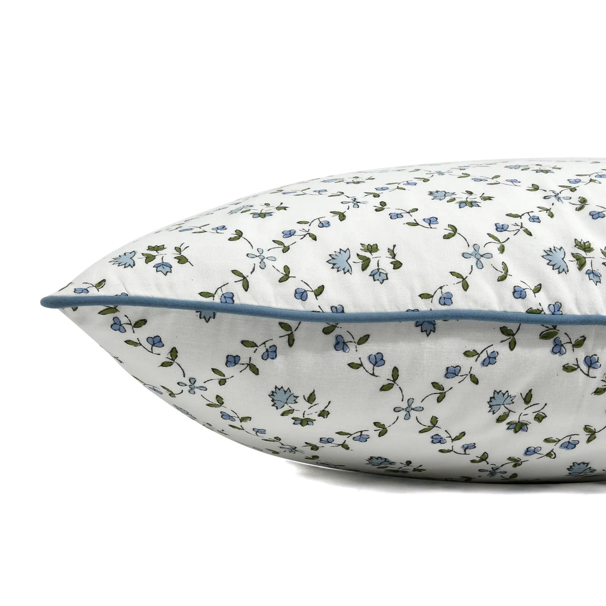 Floral-patterned pillow on a white background