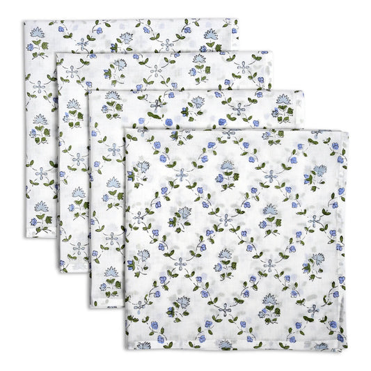 Set of three floral-patterned towels on a white background