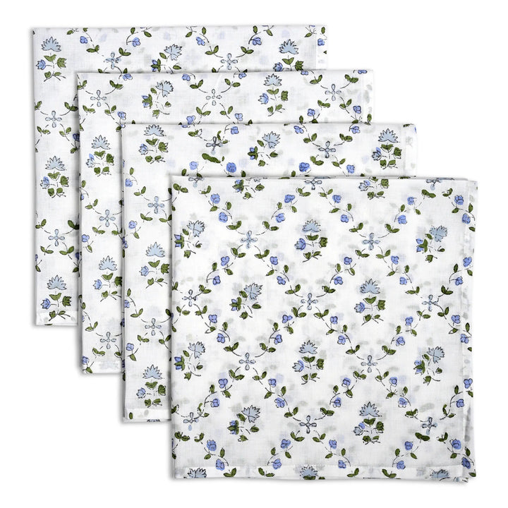 Set of three floral-patterned towels on a white background
