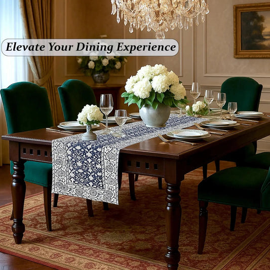 Dining room with a wooden table set for dinner, floral centerpieces, and elegant chairs.
