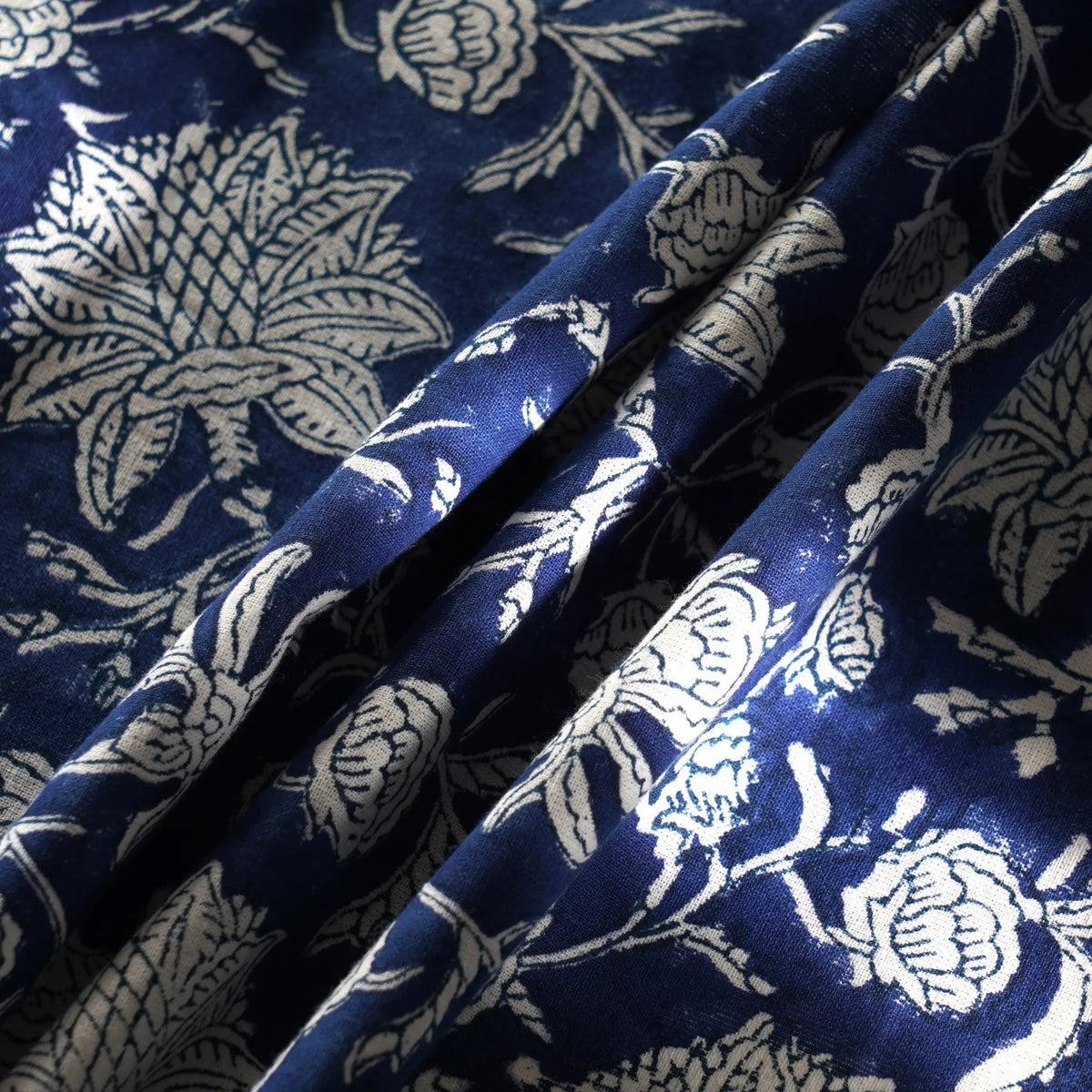 Blue fabric with white floral patterns