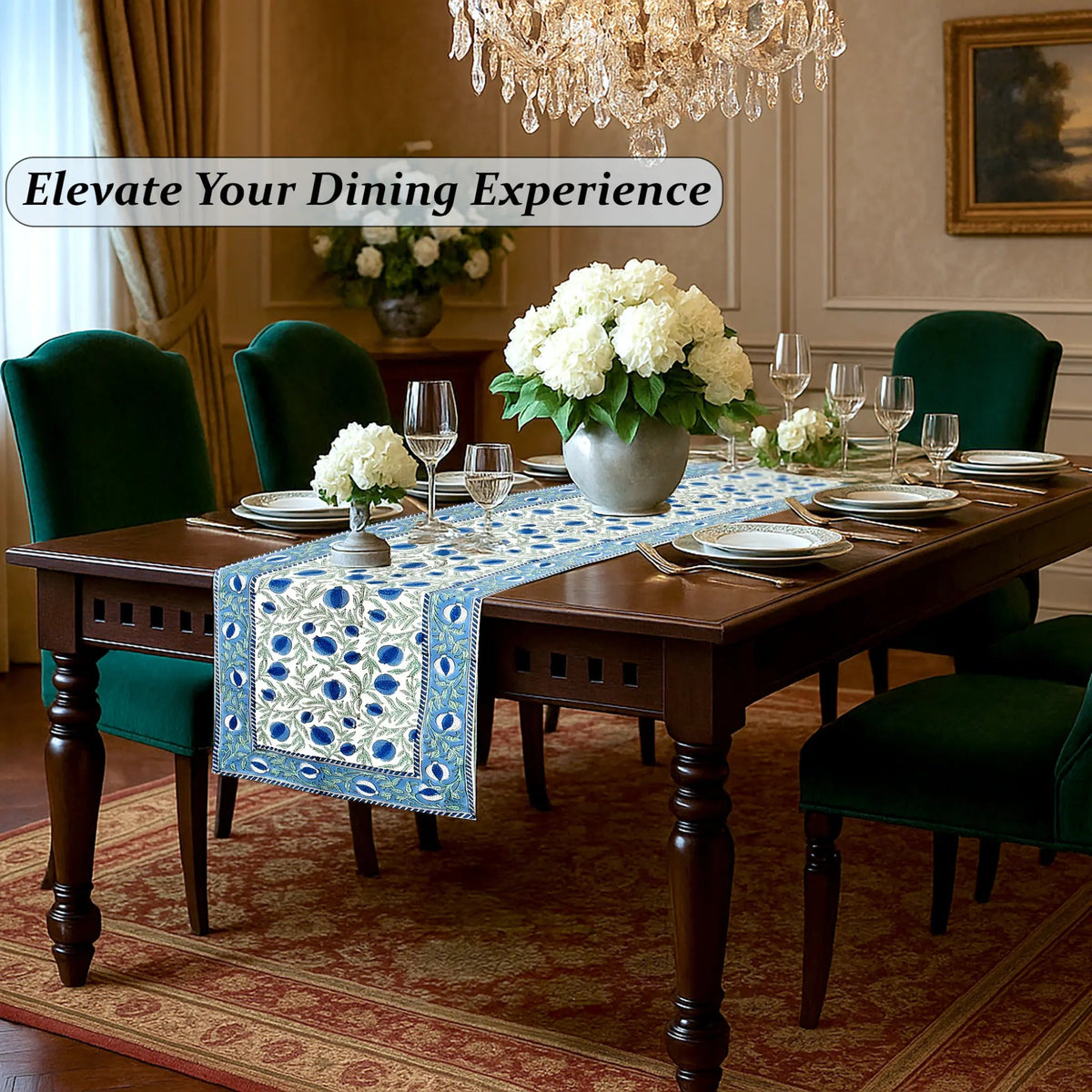 Dining room with a table set for dinner, flowers, and a chandelier.